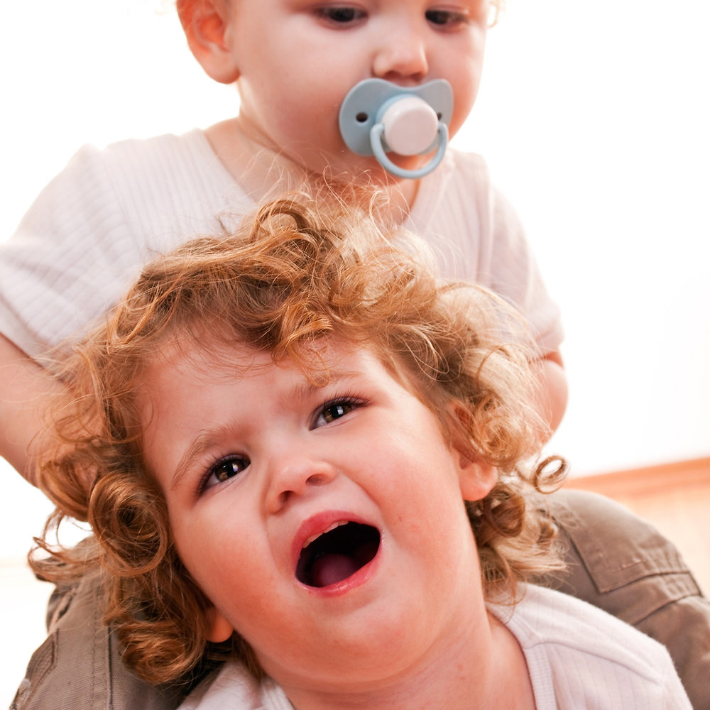 toddler bangs head on floor 