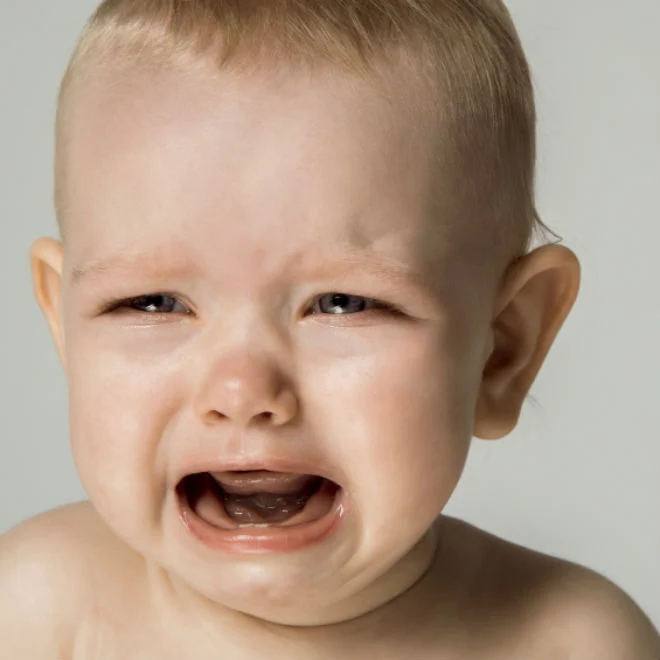 toddler bangs head on floor 