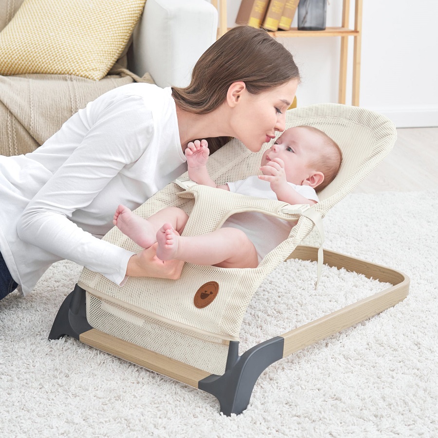 baby sleeping in bouncer