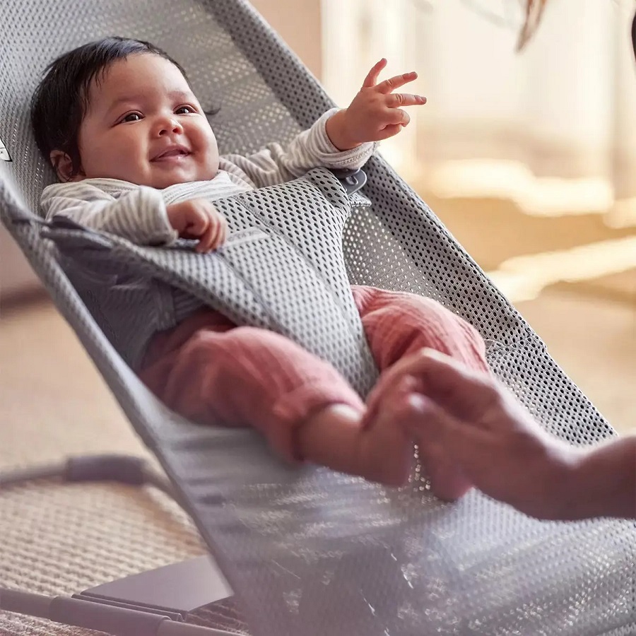 newborn in baby bjorn bouncer
