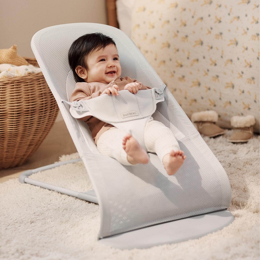 newborn in baby bjorn bouncer
